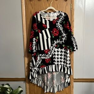 Has some spots on white stripes Pictured